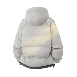 Detail view of the back of a men's winter hooded parka with quilted design and drawstring hem