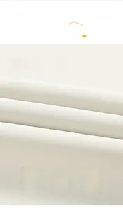 Detail of windproof off-white jacket fabric showing breathable and anti-wrinkle texture