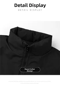 Detail view of the stand collar and durable zipper on this men's black winter jacket