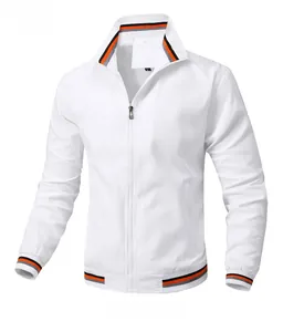 Detail of white casual jacket featuring orange and black striped ribbed cuffs and collar