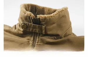 Detailed view of the khaki corduroy collar with warm faux shearling lining and metal buckle