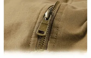 Macro shot of durable vintage metal zipper on heavy cotton warm winter jacket