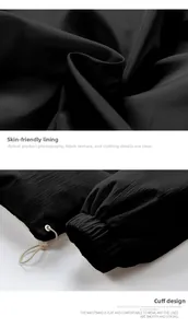 Detail of soft skin-friendly lining and adjustable drawstring cuffs on black corduroy jacket