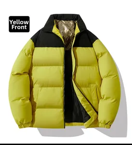Close-up of yellow and black jacket featuring GG pattern lining and stand collar