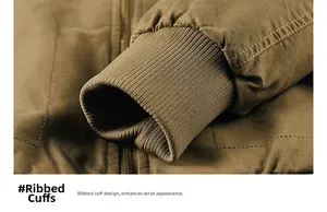 Detail of ribbed cuffs on a men's winter jacket with durable twill cotton and fine stitching
