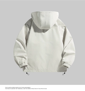 Detailed back view of a light gray waterproof outdoor hooded jacket with adjustable hem