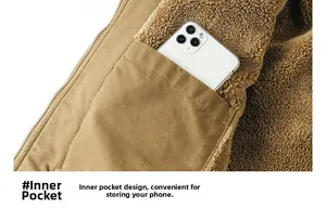 Close-up of internal pocket with warm sherpa fleece lining showing functional mobile storage