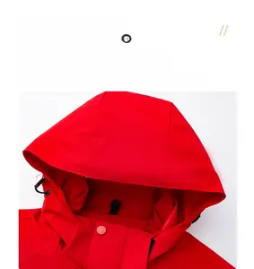 Detail view of red windbreaker hood featuring adjustable drawstrings and snap buttons