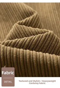 Macro shot of heavyweight corduroy fabric showing textured vertical ridges and caramel tone