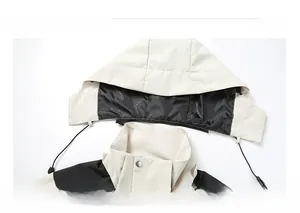 Detail of detachable hood and stand-up collar on black and beige outdoor windbreaker