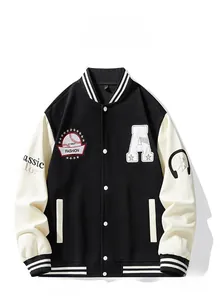 Detail of classic varsity jacket featuring contrast sleeves and embroidered patches