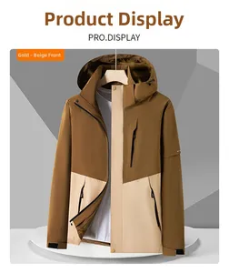 Detail view of mustard yellow and beige waterproof jacket with black zipper pockets