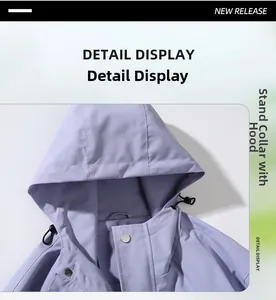 Detail view of the stand-up collar and detachable hood on a lavender outdoor jacket