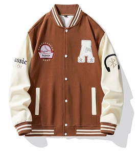 Close-up of retro baseball jacket with letter A towel embroidery and metal snap buttons