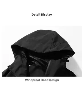 Detail of adjustable windproof hood and high-quality zipper on black outdoor jacket