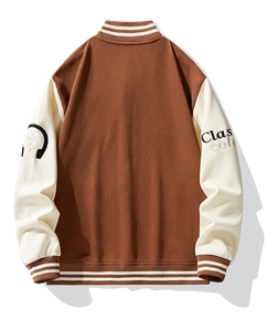 Detailed back view of vintage baseball jacket in brown and beige with striped ribbed cuffs