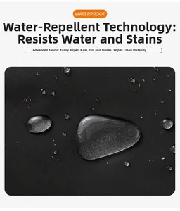 Detail of waterproof jacket fabric showing water droplets on black tech fiber surface