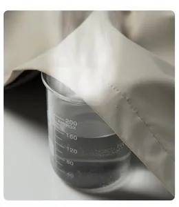 Macro shot showing the breathable and windproof fabric performance with steam test