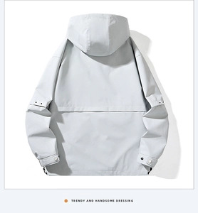 Back view of light grey outdoor windbreaker jacket with adjustable cuffs and drawstrings
