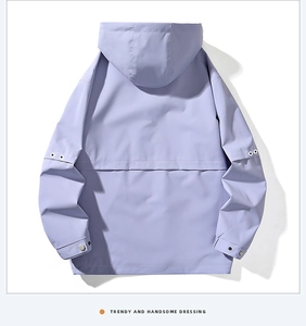 Detail view of light purple hooded windbreaker featuring back seams and metallic cuff snaps