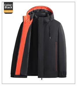Detail view of black men's sports jacket featuring vibrant orange contrast inner lining
