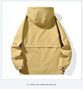 Back view of yellow windbreaker jacket with adjustable hood, cuffs, and drawstring hem