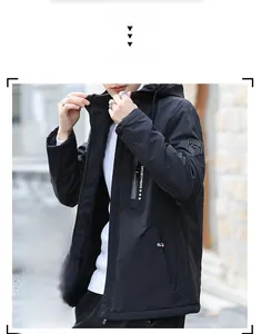 Close-up of men's thermal hooded jacket showing fleece lining and windproof fabric