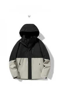Flat lay of a waterproof three-in-one jacket in black and light grey for couples