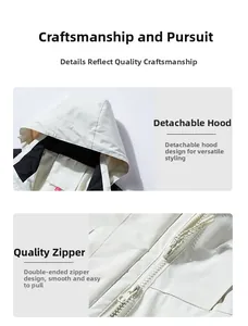 Detail view of white outdoor jacket featuring detachable hood and premium double zipper