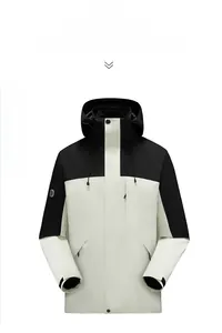Front view of two-tone outdoor jacket featuring black and cream color-blocking