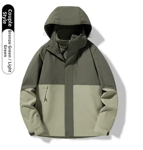 Detail of waterproof 3-in-1 jacket with bronze and matcha green contrast stitching