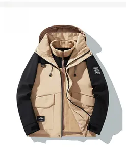 Detail view of khaki waterproof outdoor jacket with detachable fleece liner and hood