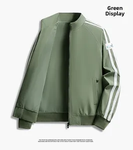 Detail of green sport jacket with white sleeve stripes and ribbed cuffs for men