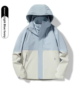 Detail of light blue and ivory women's 3-in-1 jacket with detachable fleece lining