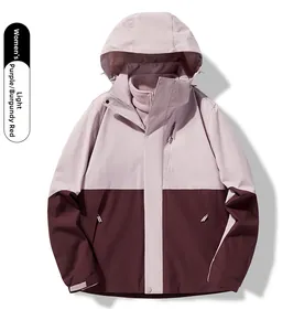 Close-up of women's 3-in-1 outdoor jacket with light purple and burgundy red patchwork