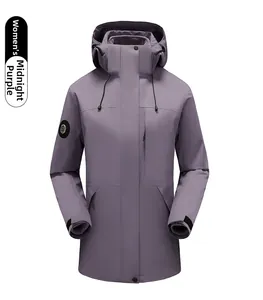 Detail view of female purple waterproof outdoor jacket with detachable hood and sleeve badge