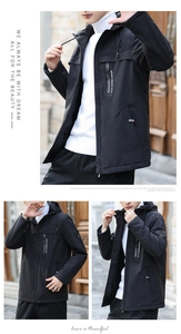 Detail of men's black hooded jacket featuring sport chest pocket and shield sleeve patch
