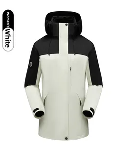 Detailed front view of women's outdoor jacket in white and black with sleeve patch detail
