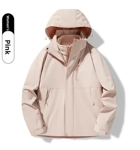 Detail view of women's pink 3-in-1 waterproof jacket with adjustable hood and zippered pockets