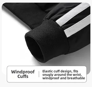 Close-up of windproof ribbed elastic cuffs with double white stripes on black jacket