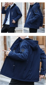 Close-up of windproof fleece lining and detailed pockets on navy men's winter jacket