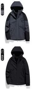 Detailed view of men's outdoor windproof jackets in dark grey and black colors
