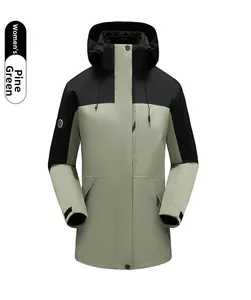 Detail of rosin green women's jacket showing contrast panels and adjustable velcro cuffs