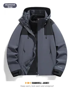 Detail of gray waterproof jacket with detachable fleece lining and windproof velcro cuffs