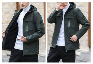 Detail of men hooded jacket with warm black fleece lining and decorative chest zipper