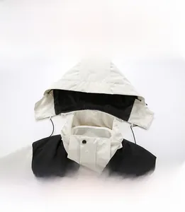Close-up of windproof detachable hood with adjustable drawstring on contrast jacket