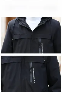 Detail of men's black hooded jacket featuring SPORTMENS print and windproof fabric