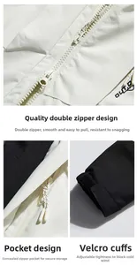 Detail view of waterproof jacket featuring two-way zipper and adjustable velcro cuffs