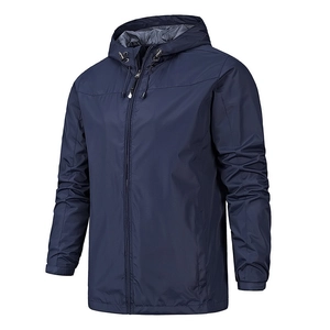 Waterproof navy blue windbreaker jacket with hood and textured fabric for outdoors