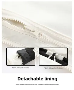 Detail of detachable lining system with secure cuffs and collar snaps on a cream outdoor jacket